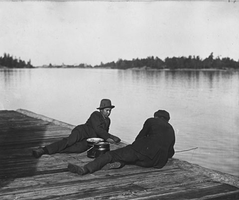978-23 – Indigenous guides fishing from an unknown dock or pier